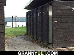 Mature blonde granny gets down and dirty in public