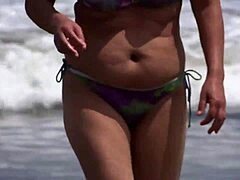 Eating pussy and getting fucked on the beach with a big booty MILF