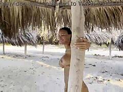 Brunett milf Monika Fox visar upp sin nakna kropp i havet och på stranden