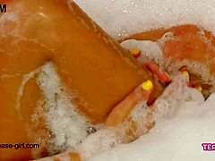 Seductive teen indulges in a sensual bath