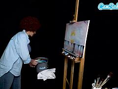 Cosplay-ul lui Ryan Keelys în timp ce Bob Ross o excită în timpul unui tutorial de pictură pe webcam